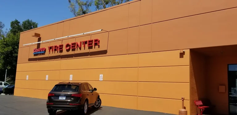Commercial exterior painting color change at Costco Tire Center in Irvine, CA completed by Southern Painting Inc.
