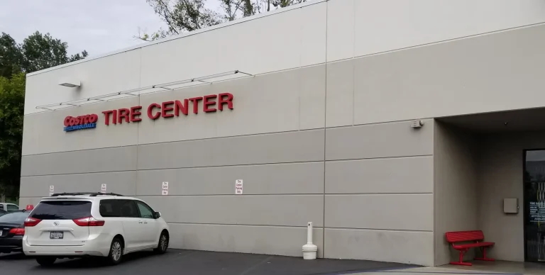 Commercial exterior painting color change at Costco Tire Center in Irvine, CA before repaint by Southern Painting Inc.