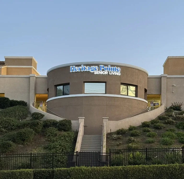 Commercial exterior rebranding & color change project at Heritage Pointe Senior Living by Southern Painting Inc.